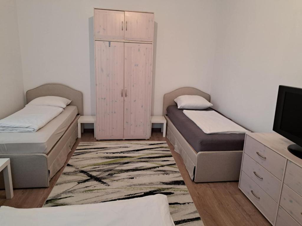 Postel nebo postele na pokoji v ubytování Ferienwohnung Grimming