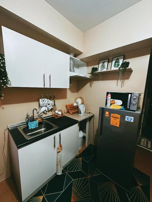 Kuchyň nebo kuchyňský kout v ubytování Comfy Sanctuary