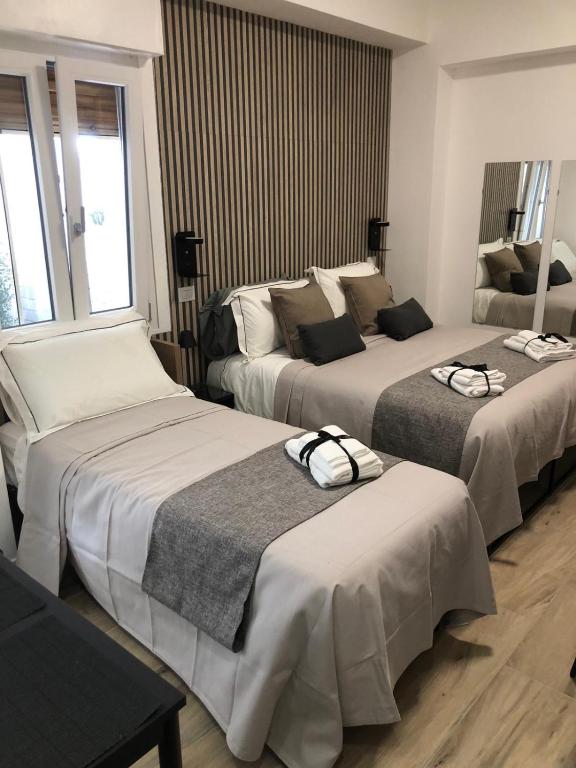 Postel nebo postele na pokoji v ubytování B&B Regina 381