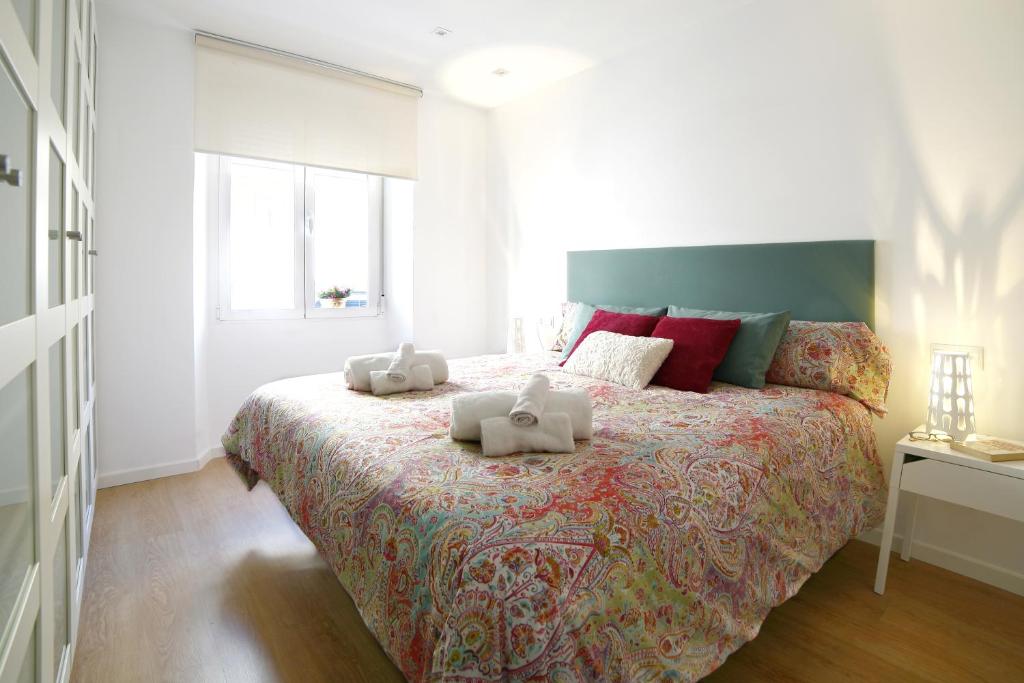 Posteľ alebo postele v izbe v ubytovaní Apartamento La Flamenquita
