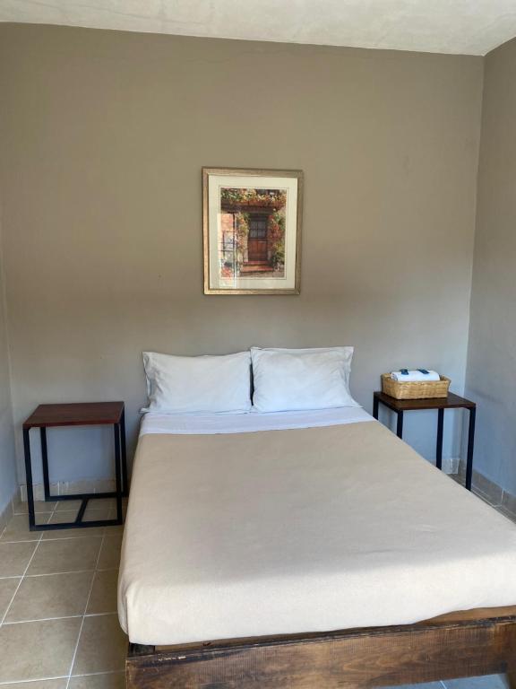 Postel nebo postele na pokoji v ubytování Hostel Inn