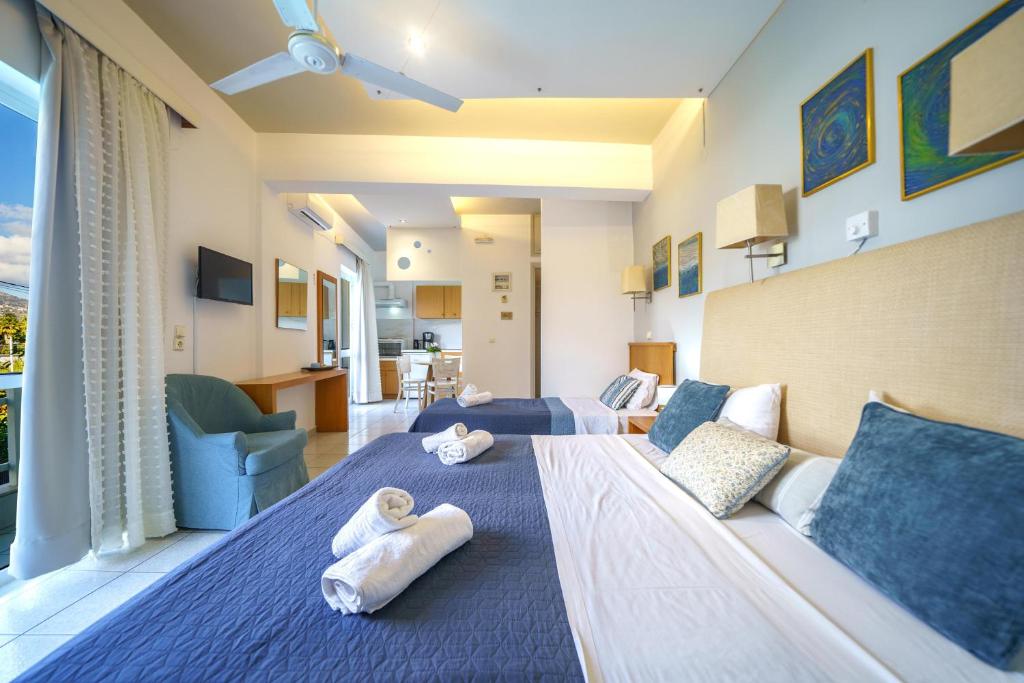 TV a/nebo společenská místnost v ubytování RODI BLUE apartments
