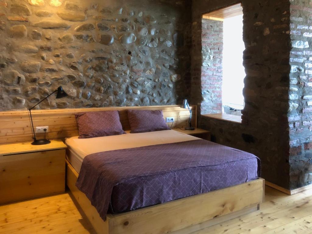 Postel nebo postele na pokoji v ubytování Lokokina Guesthouse