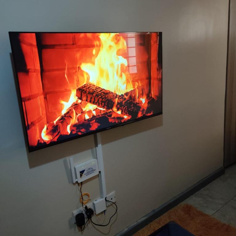 TV a/nebo společenská místnost v ubytování Jessy Stays Nairobi Fedha Estate