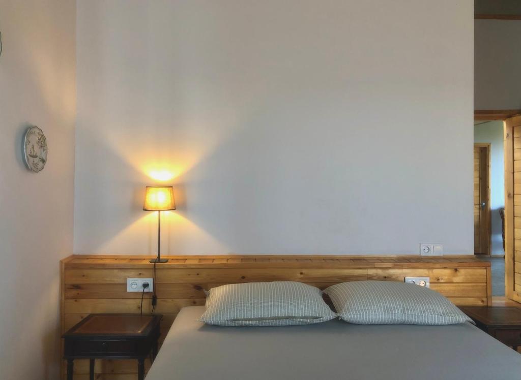 Postel nebo postele na pokoji v ubytování Lokokina Guesthouse