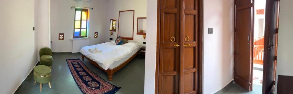 Voodi või voodid majutusasutuse Hari Niwas Guest House toas