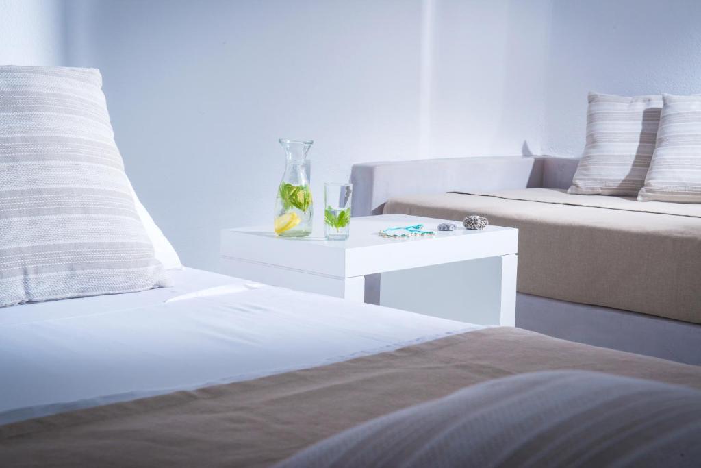 A bed or beds in a room at Peninsula Resort & Spa