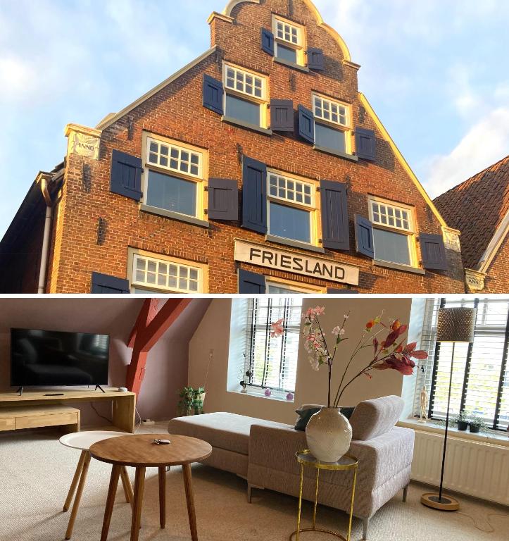 a room with a brick building with a living room at Elegant appartement in Pakhuis Friesland centrum in Leeuwarden