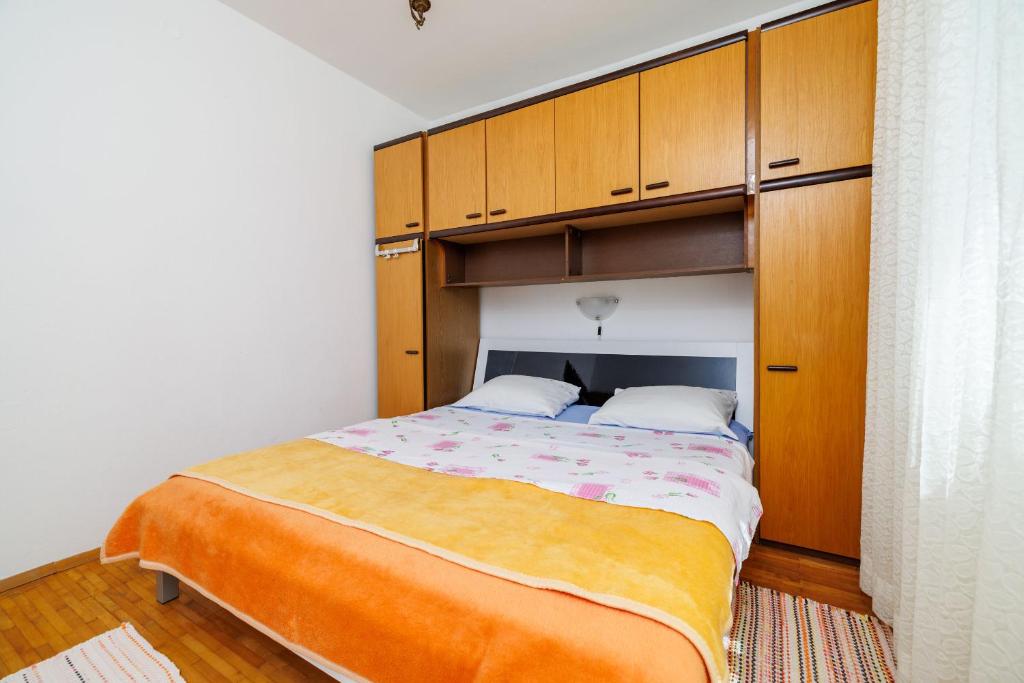 Posteľ alebo postele v izbe v ubytovaní Apartments Zvonimir