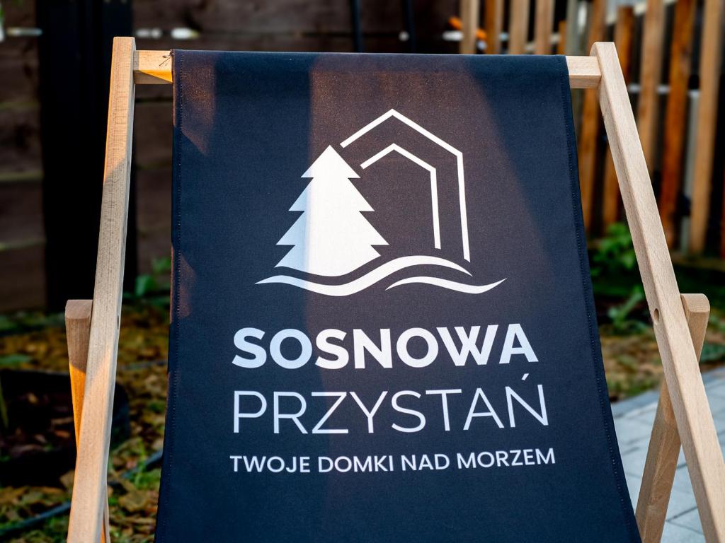 Certifikát, ocenenie alebo iný dokument vystavený v ubytovaní Nowoczesne Domki Sosnowa Przystań w Rozewiu z Jacuzzi