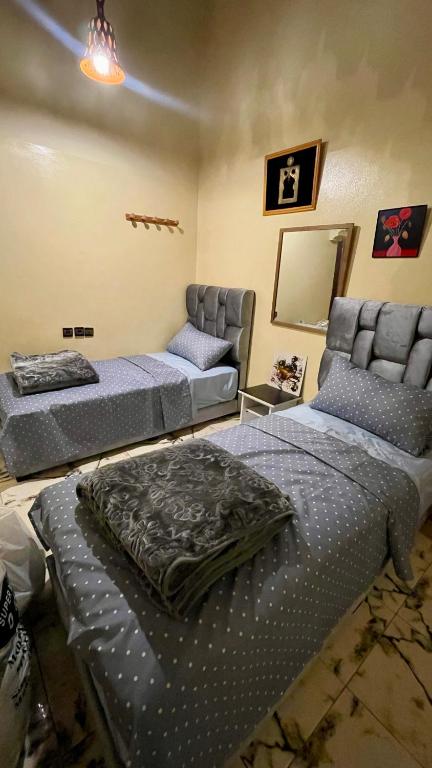 Postel nebo postele na pokoji v ubytování Riad Dar Al Manzah
