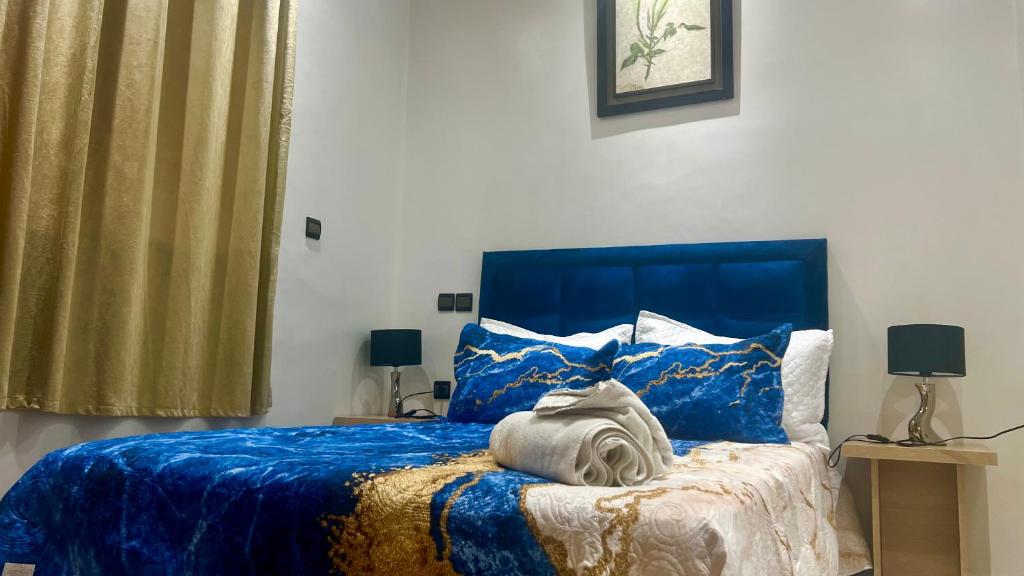 Postel nebo postele na pokoji v ubytování Appart Prestige au Centre de Rabat Luxe & Confort