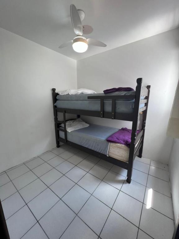 Postel nebo postele na pokoji v ubytování Triplex White em Caiobá-Matinhos-Pr a 200 mt do mar