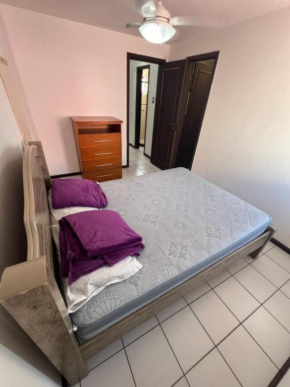 Postel nebo postele na pokoji v ubytování Triplex White em Caiobá-Matinhos-Pr a 200 mt do mar