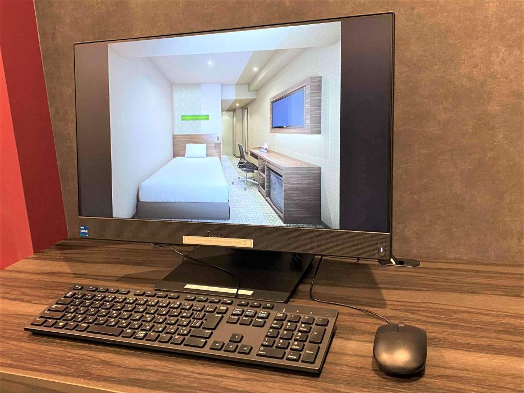 TV a/nebo společenská místnost v ubytování Smile Hotel Kanazawa Nishiguchi Ekimae