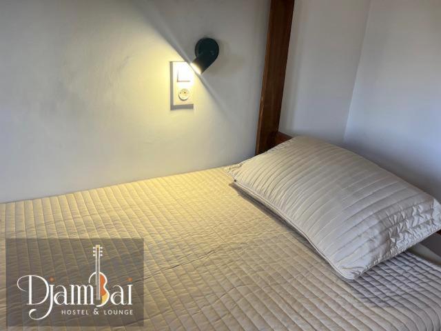 Postel nebo postele na pokoji v ubytování Hostel Djambai