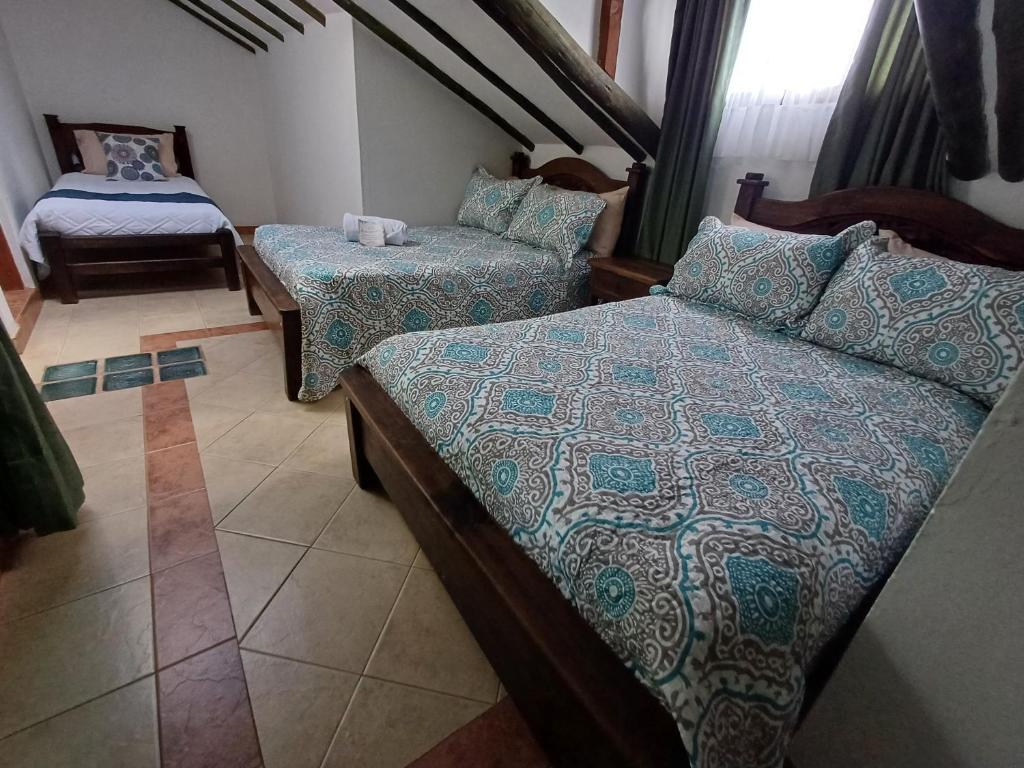 Ένα ή περισσότερα κρεβάτια σε δωμάτιο στο Mar y Luz Casita Hotel