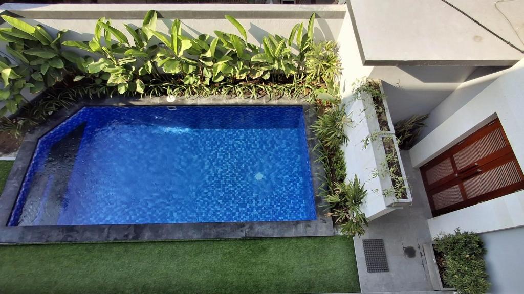 Bazén v ubytování Kutus Bali Guesthouse nebo v jeho okolí