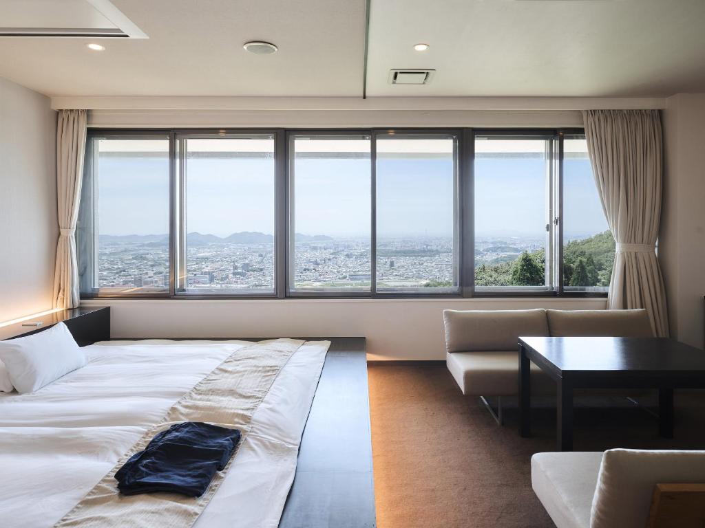 Postel nebo postele na pokoji v ubytování Setre Highland Villa Himeji