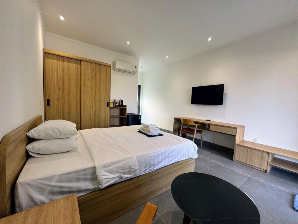 Postel nebo postele na pokoji v ubytování Minh Hai Resort
