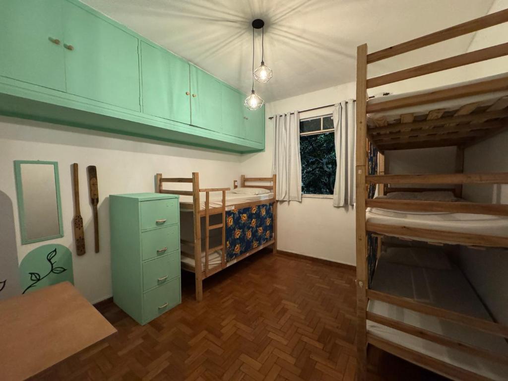 Postel nebo postele na pokoji v ubytování Savassi Hostel