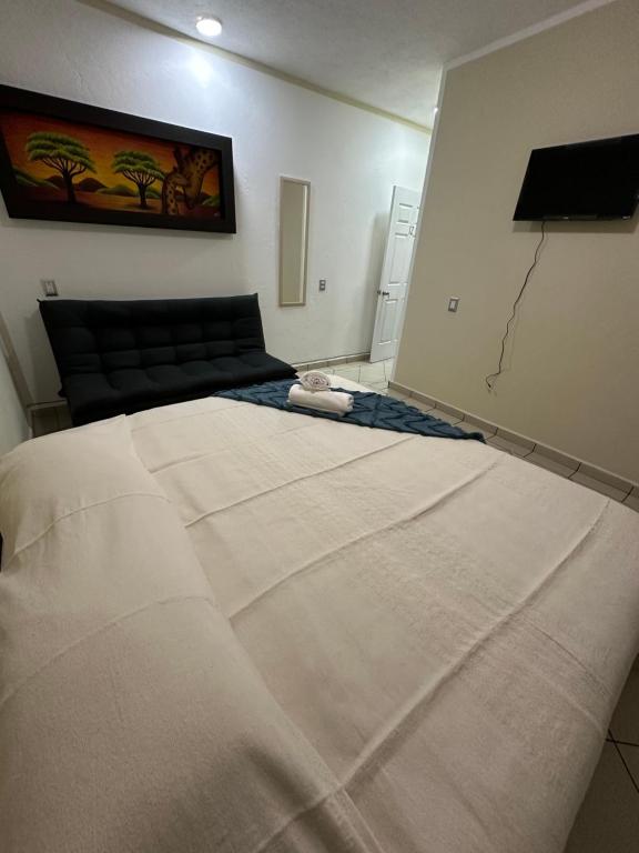 Letto o letti in una camera di Casa Eva