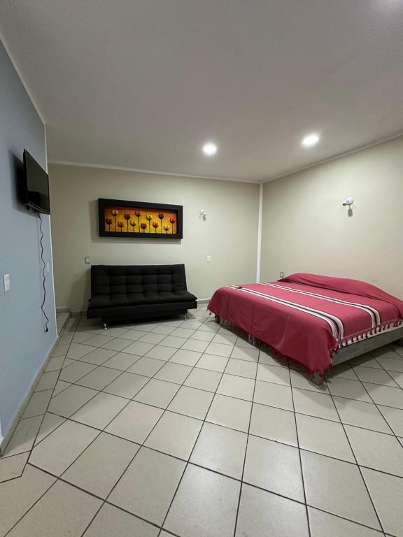 Letto o letti in una camera di Casa Eva
