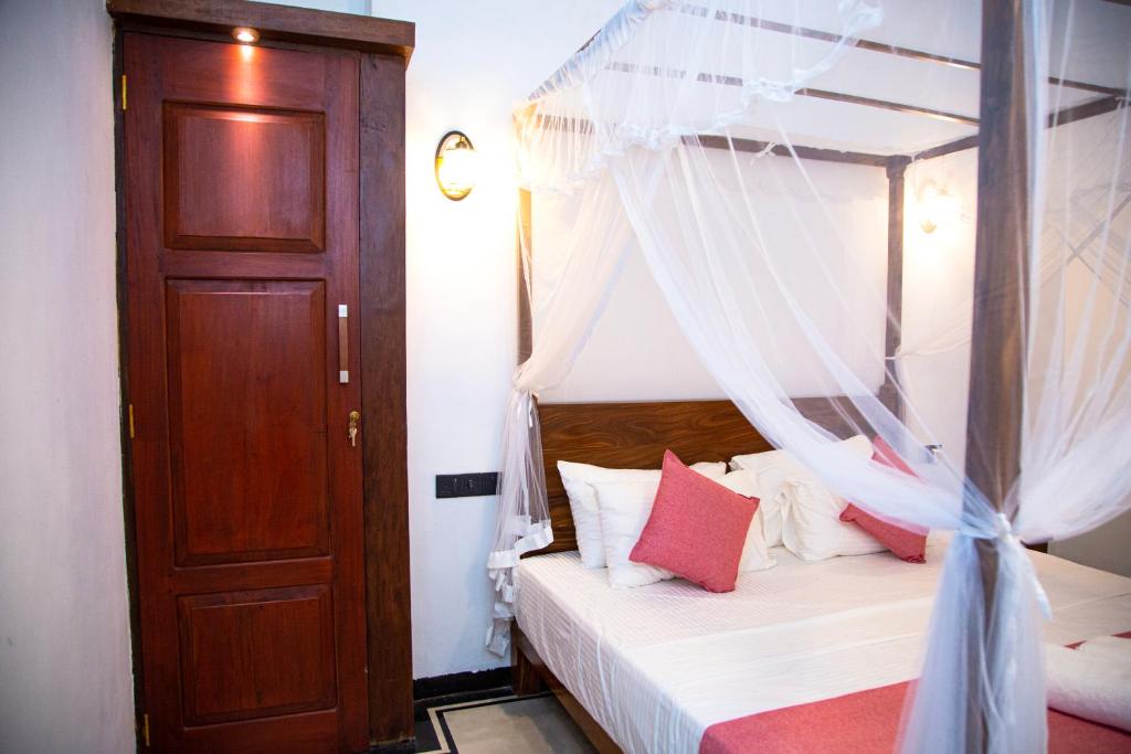 Postel nebo postele na pokoji v ubytování Sleeperwood Villa