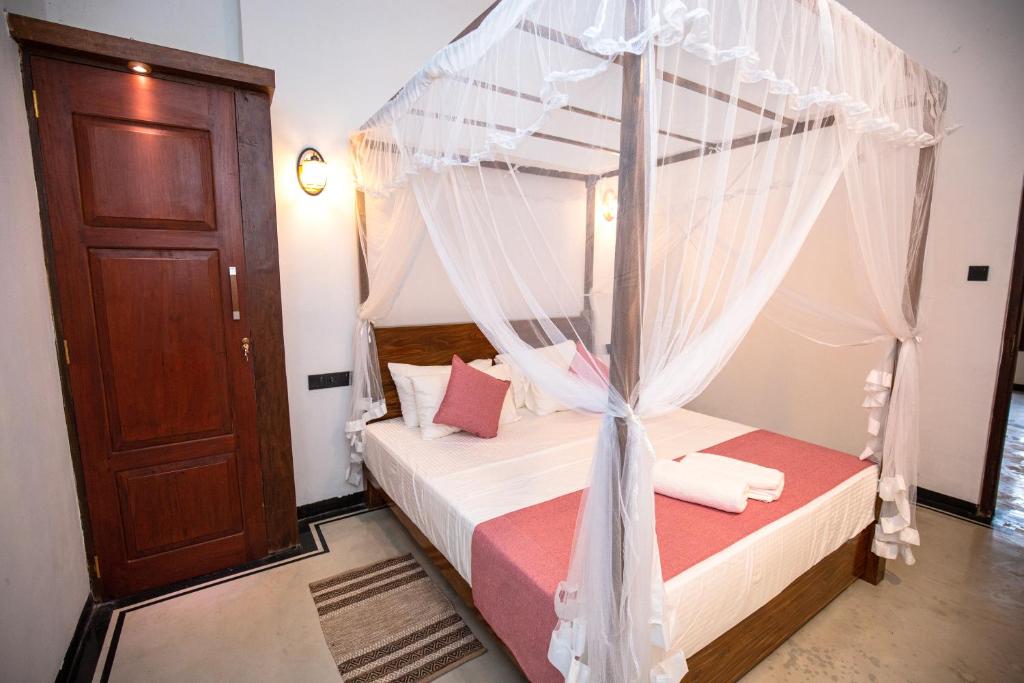 Postel nebo postele na pokoji v ubytování Sleeperwood Villa