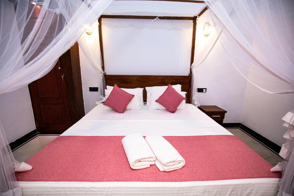 Postel nebo postele na pokoji v ubytování Sleeperwood Villa