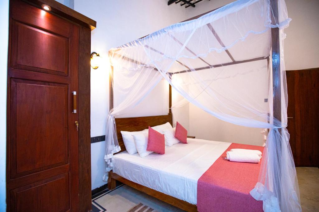 Postel nebo postele na pokoji v ubytování Sleeperwood Villa