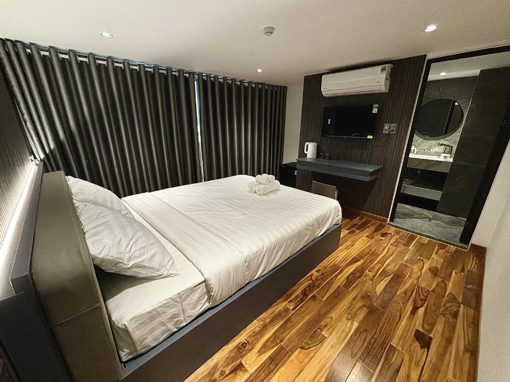 Kuchyň nebo kuchyňský kout v ubytování CEVA Hotel & Apartment Danang