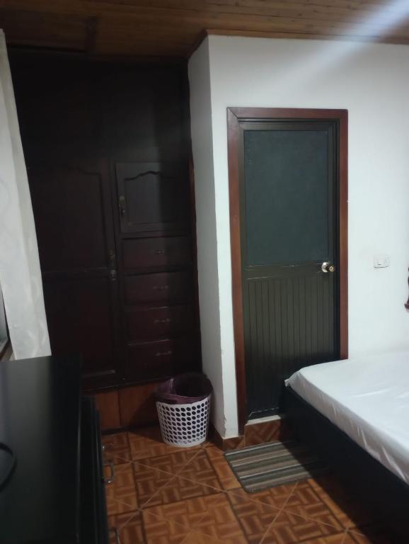 Postel nebo postele na pokoji v ubytování Hotel Bethesda 316 a 822 a 1980