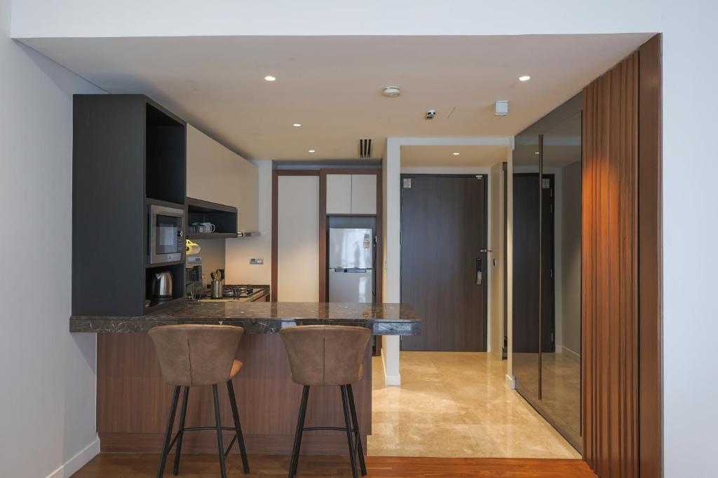 Kuchyň nebo kuchyňský kout v ubytování Anggun Residences Serviced Suites by GB