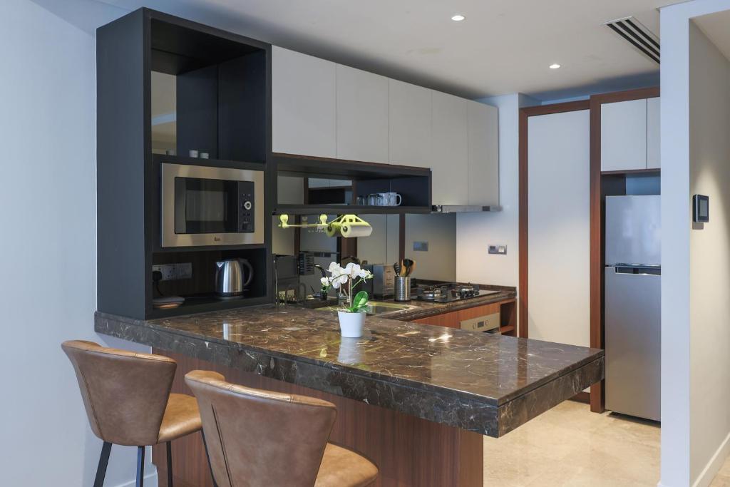 Kuchyň nebo kuchyňský kout v ubytování Anggun Residences Serviced Suites by GB