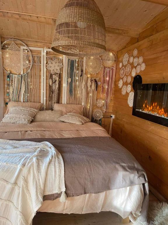 Letto o letti in una camera di Cabane Coco bohème