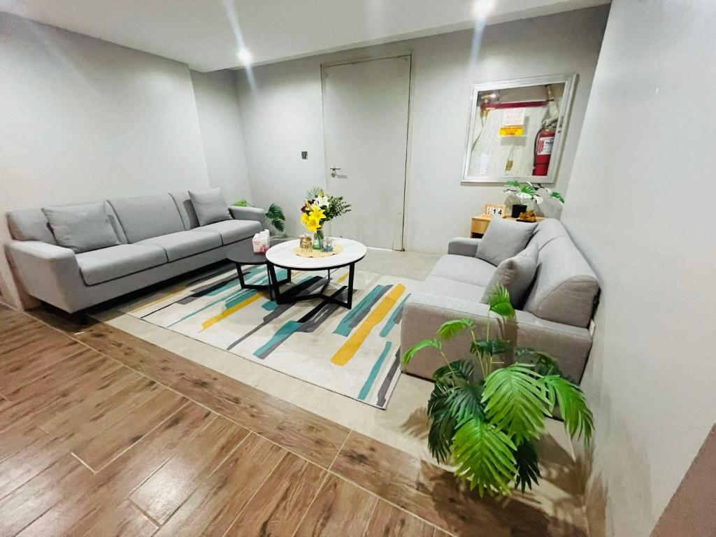 Posezení v ubytování AeonTower Suites&Hotel by CMC