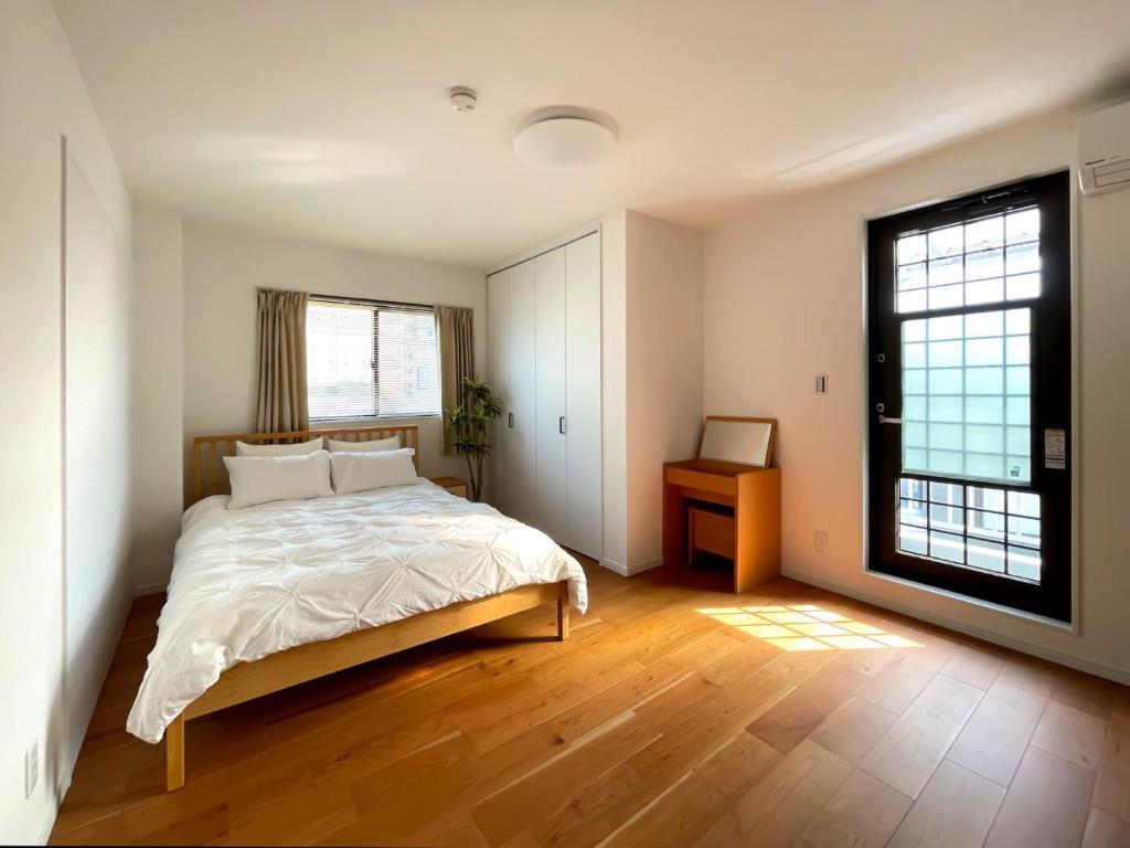 Postel nebo postele na pokoji v ubytování お宿 岸ノ四季