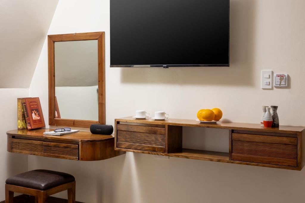 TV a/nebo společenská místnost v ubytování Sapa TT Homestay