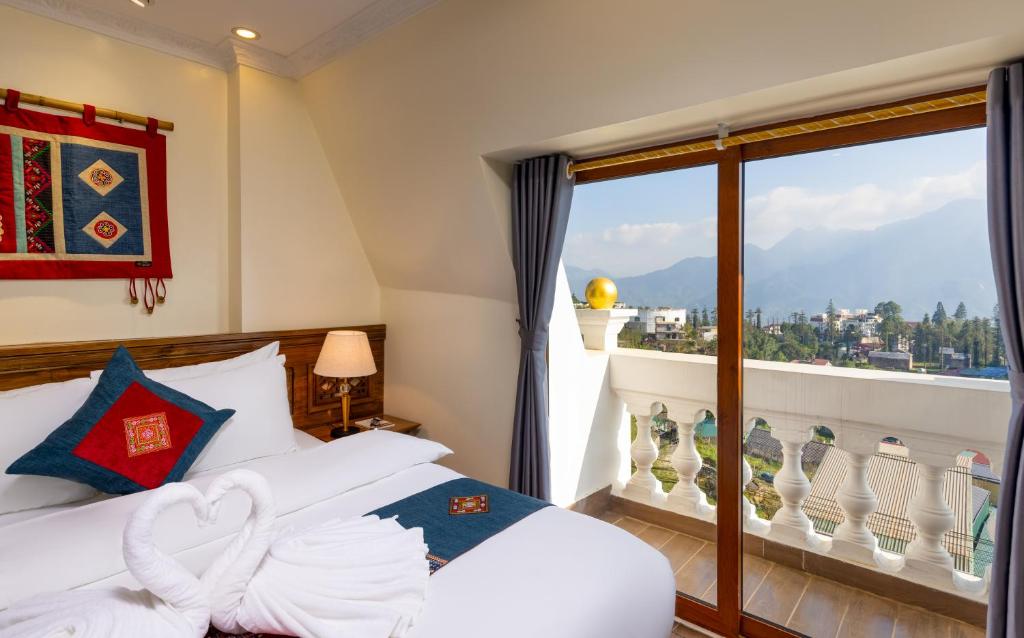Postel nebo postele na pokoji v ubytování Sapa TT Homestay