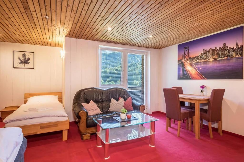 Katil atau katil-katil dalam bilik di Ferienhaus Villa Kanisblick
