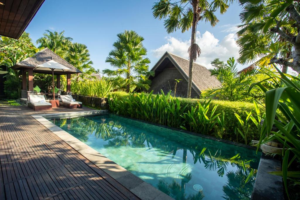 Bazén v ubytování Sanctoo Suites & Villas nebo v jeho okolí
