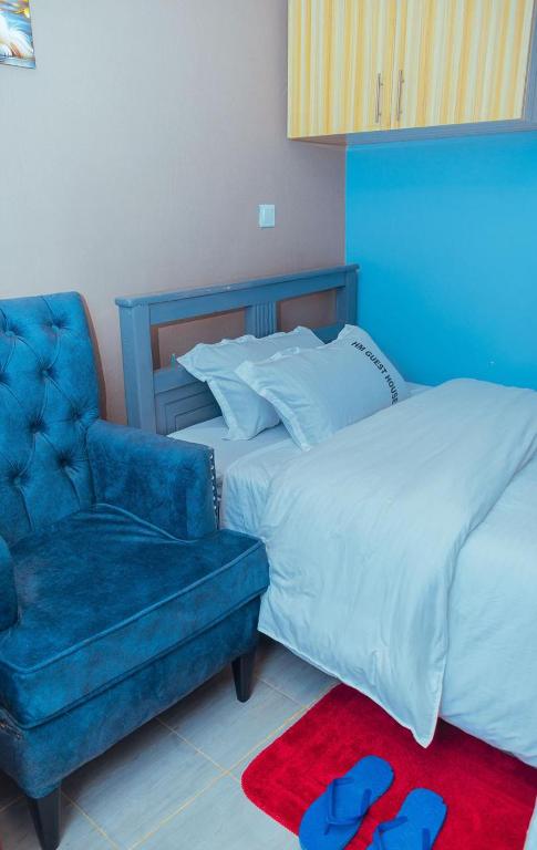 Postel nebo postele na pokoji v ubytování HM guest house