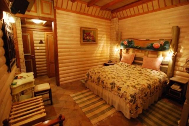 Postel nebo postele na pokoji v ubytování Lithos