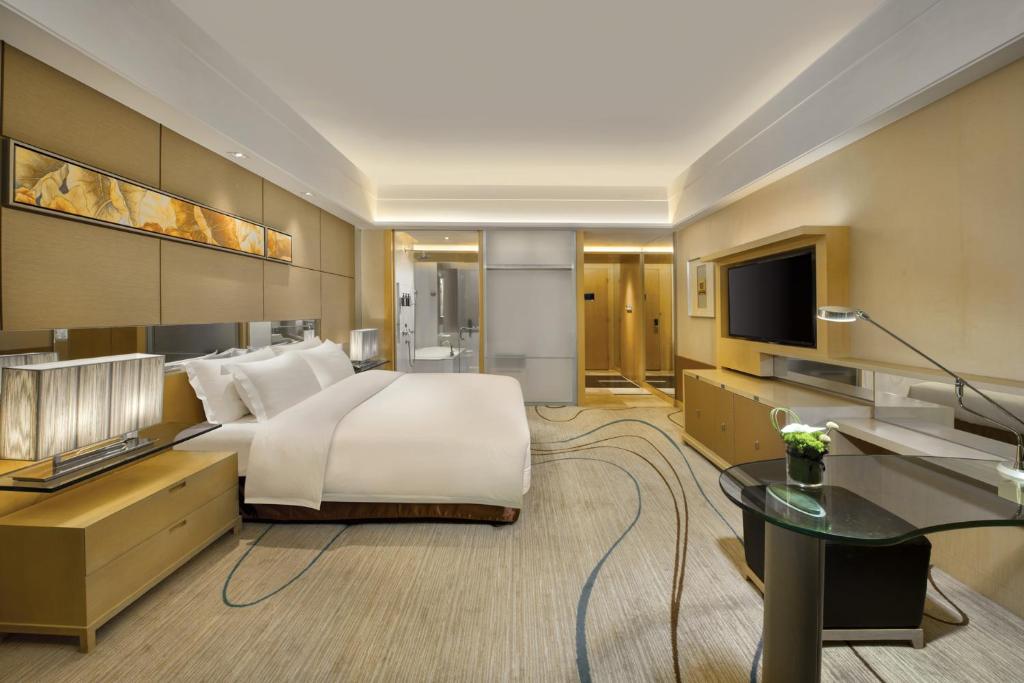 TV a/nebo společenská místnost v ubytování Dongguan Royal Garden Hotel