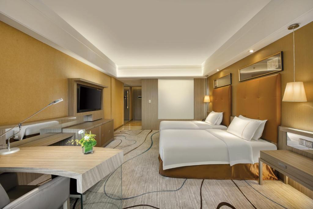 TV a/nebo společenská místnost v ubytování Dongguan Royal Garden Hotel