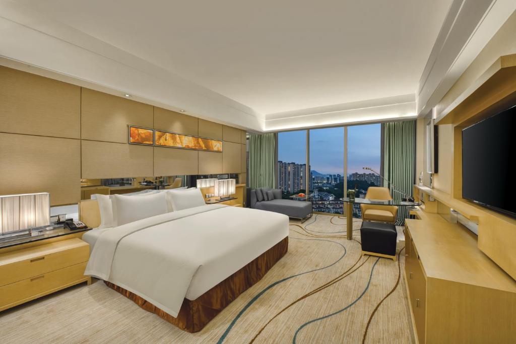 TV a/nebo společenská místnost v ubytování Dongguan Royal Garden Hotel
