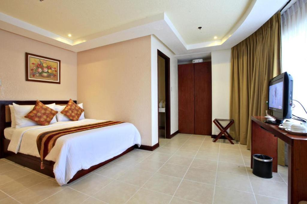 TV a/nebo společenská místnost v ubytování Hotel Centro Puerto Princesa Near Airport