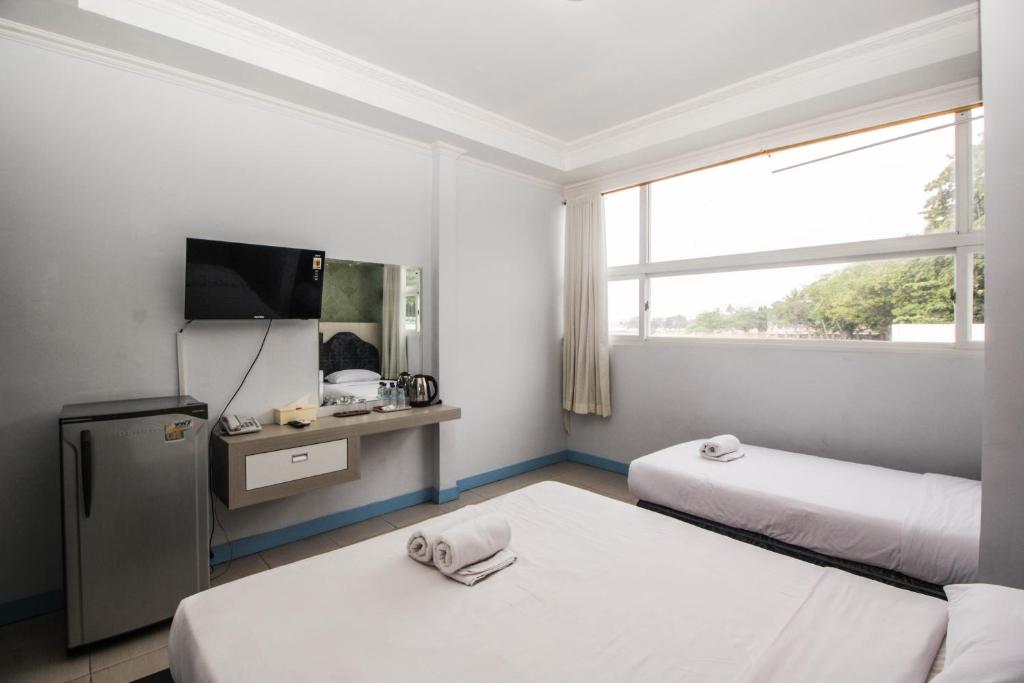 Postel nebo postele na pokoji v ubytování Allisa Resort Hotel