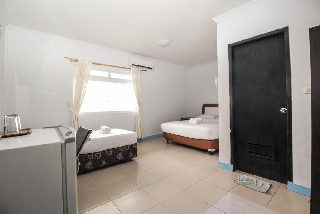 Postel nebo postele na pokoji v ubytování Allisa Resort Hotel